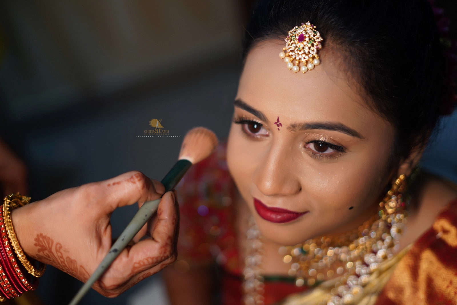 Bride getting ready makeup moment – Cinematic Portraits by Chikkarams Photography in Hyderabad